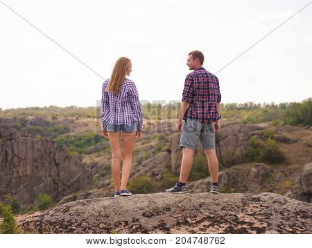 A young couple came to the mountains for a vacation. Healthy lifestyle.