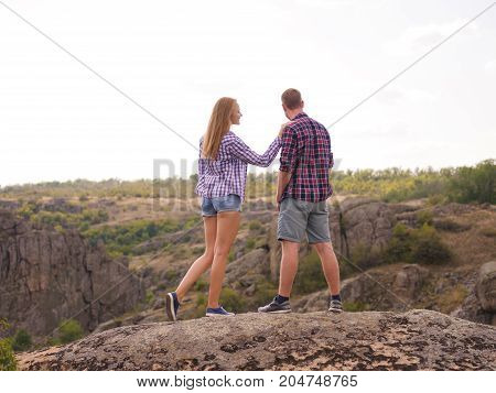 A young couple came to the mountains for a vacation. Healthy lifestyle.