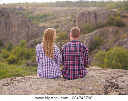 A young couple came to the mountains for a vacation. Healthy lifestyle.