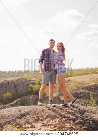 A young couple came to the mountains for a vacation. Healthy lifestyle.