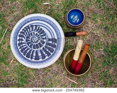 Image of tibetan bowls. Tools for energy. The sound of singing bowls. Yoga time.