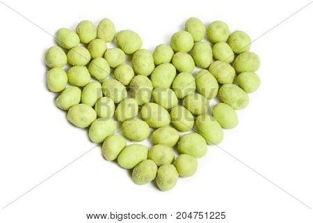 Forming wasabi peanut isolated on white background.