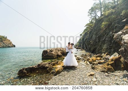 Romantic dating. Young loving couple embracing on nature.