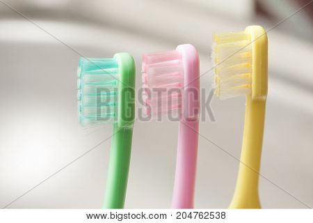 Child's tooth brushes in a row  - stock image