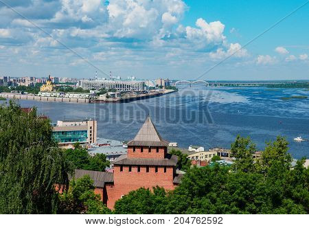 View on Kremlin tower and Strelka - place of Oka and Volga rivers junction in Nizhniy Novgorod. View from viewing point in Nizhny Novgorod Kremlin
