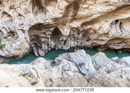 Mountain river at the bottom of El Chorro gorge in Malaga Andalusia Spain