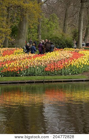 LISSE NETHERLANDS - APRIL 19 2017: Visitors at the Keukenhof Garden in Lisse Holland Netherlands.