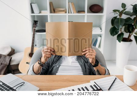 Musician Reading Magazine