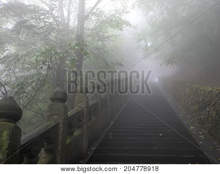 The Wudang MountainsHubei China. Many Taoist monasteries to be found thereIt's world heritate and famous in one of China. This here have a good weather somethime it a lot of the fog. Many stairs in there.