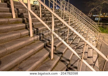 Wide stairs for thousands of spectator audiance at a football stadium