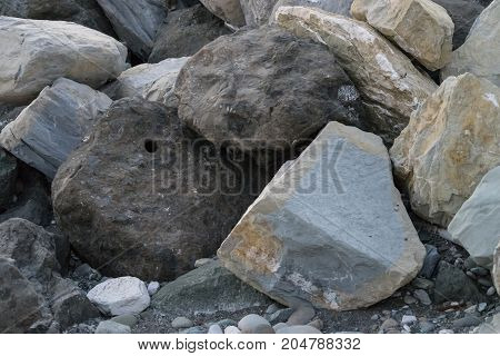 huge stones lying on the sea to protect the shore from blur in Imereti Bay 