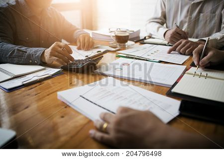 Co-workers are consultants on business documents tax transactions and business combinations after a bankrupt merger with a newly founded company.