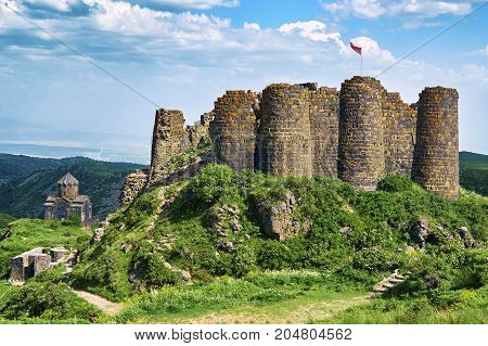 Summer view of the beautiful medieval fortress Amberd in Armenia