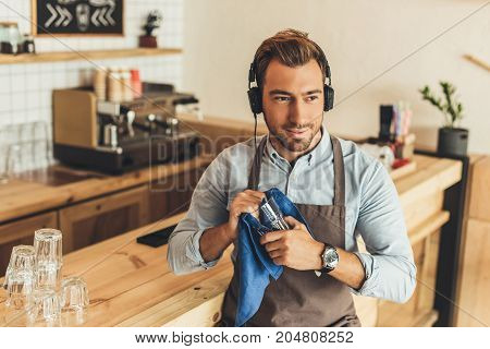 Worker Cleaning Glassware