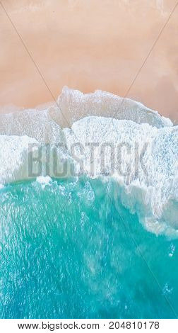 Sea Aerial view Top viewamazing nature background.The color of the water and beautifully bright.Azure beach with rocky mountains and clear water of Thailand ocean at sunny day.flying dronesea view