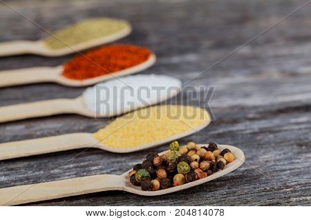 Spices And Herbs On Old Kitchen Table.