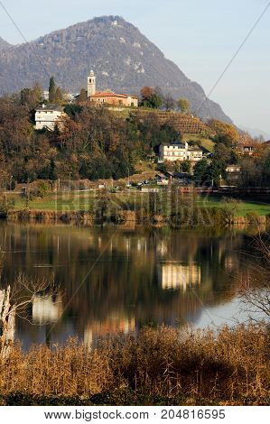 The Church Of Sorengo And Lake Muzzano
