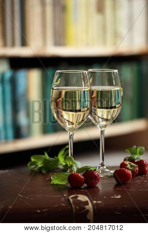 Wineglasses With White Wine Decorated With Strawberry And Mint