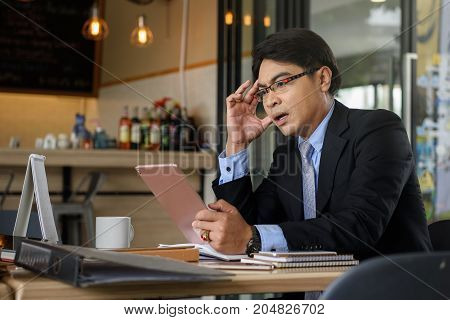 Businessman See Bad News By Tablet