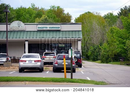 PETOSKEY, MICHIGAN / UNITED STATES - MAY 30, 2017: Crooked Tree Breadworks offers baguettes, sourdough bread, pastries and coffee, in the Clock Tower Plaza, a strip mall conveniently located between Harbor Springs and Petoskey.