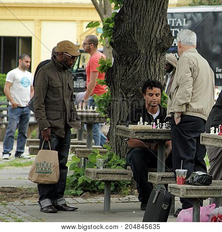 Washington DC - April 30, 2011: People playing chess on Dupont Circle in Washington DC