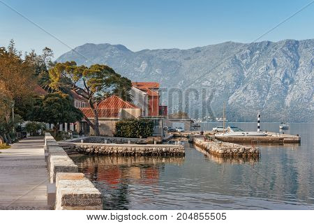 Embankment in Prcanj town. Autumn in Montenegro