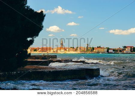 Sunset On The Seashore. City View Walk Along The Seafront