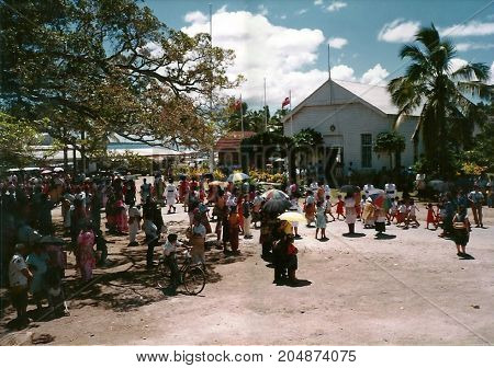 NUKU'ALOFA, TONGATAPU / TONGA - CIRCA 1990: Tongan people gather to watch a parade during a national holiday.