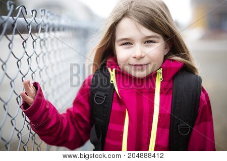 A Portrait of a Young Kid at school