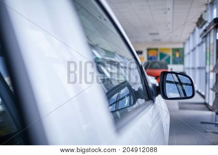 Beautiful exterior of a modern car. New cars in the showroom.