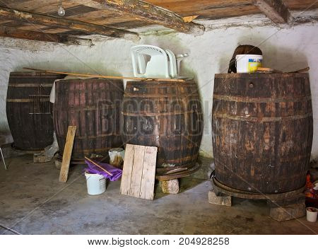 Old wine barrels in cellar, not in usage any more