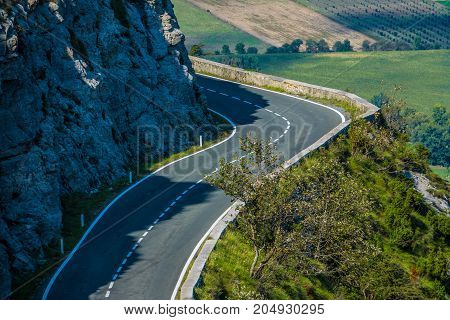 Left curve in the road of a mountains port Spain