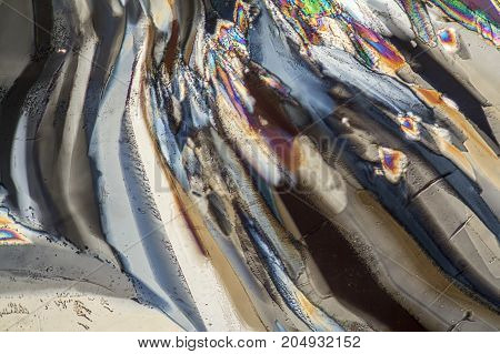 colorful microscopic shot of Trisodium citrate microcrystals in polarized light