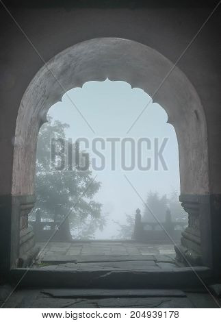 The shadow from the door at the Wudang Mountains Many Taoist monasteries to be found thereIt's world heritate and famous in one of China. This here have a good weather sometime it a lot of the fog.