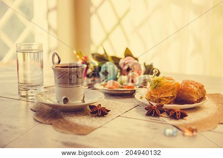 Cup Of Turkish Coffee And A Plate With Baklava