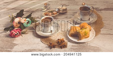 Cups Of Turkish Coffee And A Plate With Baklava