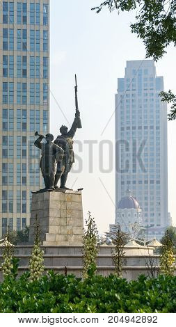 Tianjin, China - Nov 1, 2016: Commemorative statutes of patriotic soldiers in a public park.