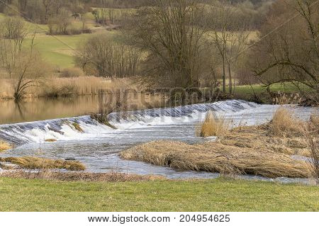 rural impression at the Jagst river near a small village named Oberregenbach near Langenburg in Hohenlohe a area in Southern Germany