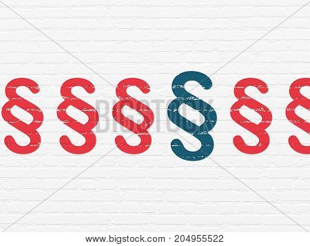 Law concept: row of Painted red paragraph icons around blue paragraph icon on White Brick wall background