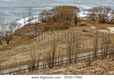 Railroad Tracks Passing Near Manistee Lake In Michigan