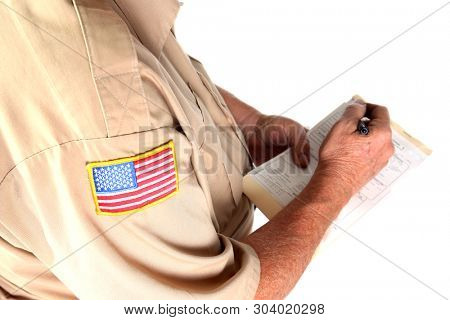 Police man writing a ticket. Police officer issuing a speeding or traffic ticket. Isolated on white. Room for text. 
