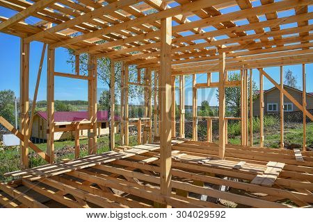 Wood Frame Residential Building Under Construction.building Construction, Wood Framing Structure At