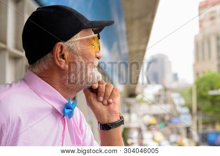 Handsome Senior Tourist Man Exploring The City Of Bangkok, Thail