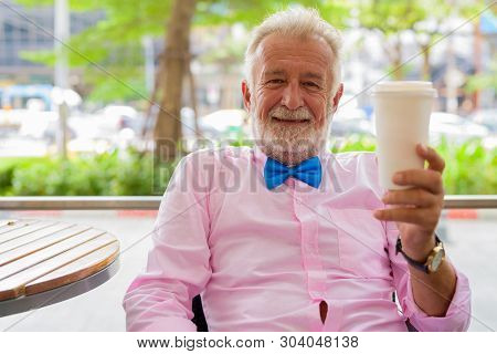 Handsome Senior Tourist Man Exploring The City Of Bangkok, Thail