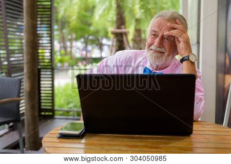Handsome Senior Tourist Man Exploring The City Of Bangkok, Thail