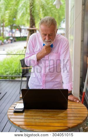 Handsome Senior Tourist Man Exploring The City Of Bangkok, Thail