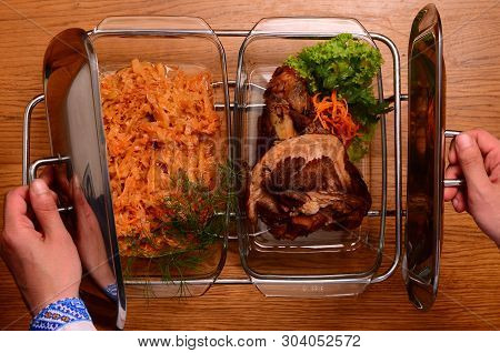 Potatoes And Meat On A Baking Tray