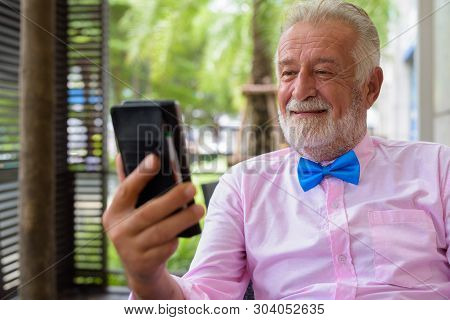 Handsome Senior Tourist Man Exploring The City Of Bangkok, Thail