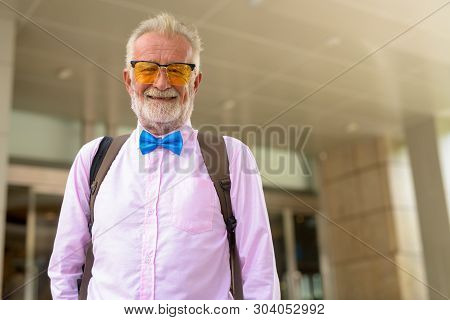 Handsome Senior Tourist Man Exploring The City Of Bangkok, Thail