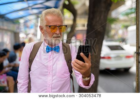 Handsome Senior Tourist Man Exploring The City Of Bangkok, Thail